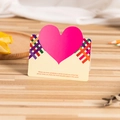 Creative 3D pop-up heart greeting card in beige with pink heart on a wooden desk - Beige Heart