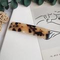 Macro view of rectangular tortoise shell acetate hair clip with leopard print texture - Light Tortoiseshell