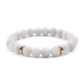 Macro view of white natural stone bead bracelet with rose gold metal spacers - White Stone