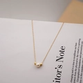 Minimalist freshwater pearl pendant necklace on titanium steel chain in golden finish - Single Pearl Style