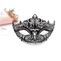 Detailed close-up of a black metal masquerade mask with pink rhinestones and laser-cut patterns - One Size / Black with Fuchsia Rhinestones