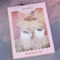 Detailed gift set featuring a mesh swan headband and bow socks in a pink display box - Pale Yellow Swan