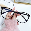 Classic large black round frame glasses with blue light blocking lenses held by hand - Frame Only (No Lens) / Glossy Black Frame