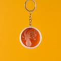 Realistische mini octopus soepkom sleutelhanger met oranje hars en zilveren metalen ring - Inktvis