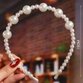 Detail showing various sizes of white faux pearls on a 15cm diameter bridal headband - S186-2 Gradient Size Pearls