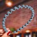 Detail showing 13.5CM size measurement of Morandi blue wavy resin headband - Grey (Wave Matte)