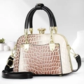 Detail of crocodile embossed leather handbag with vintage crystal clasp and gold hardware - Light Khaki