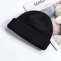 Classic black waffle knit beanie hat with cuffed edge and minimalist streetwear design - One Size / Black