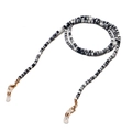 Detalle de cuentas de arcilla hechas a mano en negro blanco y gris con cierres dorados - Negro & Blanco