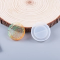 Detail of round silicone mold with green and yellow glitter resin shaker pendant - Round Shape Quicksand Mold