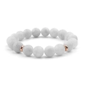 Macro detail of natural white marble beads bracelet with rose gold plated spacers - White Turquoise