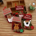 Lot de 4 chaussettes de Noël rustiques avec motifs Père Noël, bonhomme de neige et renne - Lot de 4 petites chaussettes avec bordure en fausse fourrure