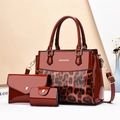 Detailed view of the 3-piece set featuring dark red patent leather and leopard print patterns - Red
