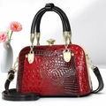 Detail of red black gradient faux crocodile leather handbag with gold crystal lock - Red