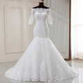 Elegante off-shoulder fishtail trouwjurk met gedetailleerd kant en halflange mouwen - US 2 / Wit