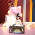 Cute resin girl figurine in yellow Hanfu writing at a desk with a pink lantern lamp - Painting Princess with Lamp (24A)