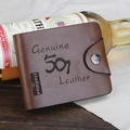 Detail of vintage brown trifold wallet with leather texture and secure metal snap closure - Classic Embossed Round Buckle