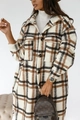 Detail of long plaid shacket featuring large checks and front buttoned chest pockets - S / Brown