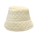 Detail of cream quilted bucket hat showing soft velvet texture and rhombic stitching - M (56-58cm) / White
