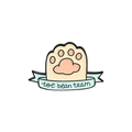 Close-up of cute cat paw enamel pin with toe bean team ribbon on white background - Beige Ribbon Cat Paw-toe bean team