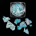 Irregular blue iridescent shell flakes for nail art in a transparent square jar - Iridescent Blue