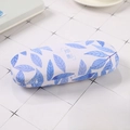 Minimalist white glasses case with blue leaf pattern and durable hardshell design - Leaf Shadow