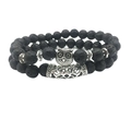 Lava rock beaded bracelet set featuring silver owl charm and vintage carved tubes - Lava Stone