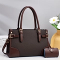 Detailed shot of brown textured tote bag with golden buckles and mini card holder - Coffee