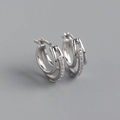Detailed close-up of S925 sterling silver double hoop earrings with sparkling zircon stones - White Gold