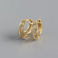 Close-up of S925 sterling silver triple-hoop earrings with gold finish and inlaid diamonds - Gold
