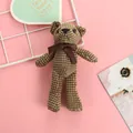 Brown checkered plush bear pendant with brown bow on a pink decorative background - Brown Yellow Plaid
