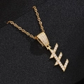 Close-up of gold lightning bolt E pendant necklace with micro-set cubic zirconia - Letter E