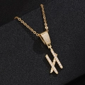 Close-up of golden letter H pendant with pave-set zircons on a sturdy cross chain - Letter H