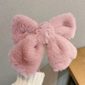 Plüschige rosa Samtschleife-Haarklammer mit weicher Textur für elegante Frisuren - Rosa