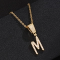 Elegant gold-tone letter M pendant necklace with shimmering cubic zirconia stones - M