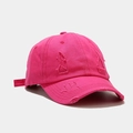 Detail view of distressed rose pink cotton baseball cap with ripped frayed edges - Rose Red