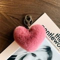 Detailed view of pink leopard heart plush keychain with golden metal clasp hardware - Rose Pink