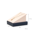 Dark blue PU leather jewelry display stand with a golden necklace on a pink surface - Pendant Stand