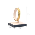 Gold star engraved bracelet on professional navy blue display stand with size markers - Bracelet Ring Holder