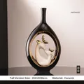 Jarrón moderno de cerámica negro y oro con estatuas de ciervos blancos, 20x10x38cm - Jarrón Nostalgia Estilo Delgado y Alto-Negro Oro