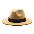 Detail of khaki wool fedora hat with a black grosgrain ribbon and flat brim profile - Camel