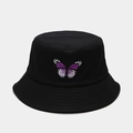 Detailed close-up of a black cotton bucket hat featuring purple butterfly embroidery - Black With Purple Butterfly