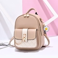 Chic beige PU leather mini backpack with daisy charm and metal chain on geometric stand - Khaki