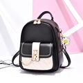 Mini PU leather backpack with black and white quilted patterns and daisy charm - Black
