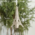 Golden Eiffel Tower Christmas ornament with glitter finish and white hanging ribbon - Champagne Eiffel Tower Pendant