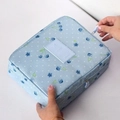 Light blue large travel toiletry bag with cherry polka dot print and zipper closure - Blue Cherry