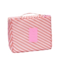 Pink and white striped travel toiletry bag with zipper and handle for organization - Pink Stripe