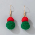 Detail of festive Christmas drop earrings with red and green pom poms and gold ear hooks - Double Layer Red & Green Pom Poms