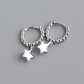 Macro shot of S925 sterling silver hoop earrings with polished round beads and star charms - 925 Silver / White Gold (Pair)
