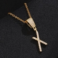 Detail of 18K gold letter X pendant with micro-pave cubic zirconia on thin link chain - Letter X